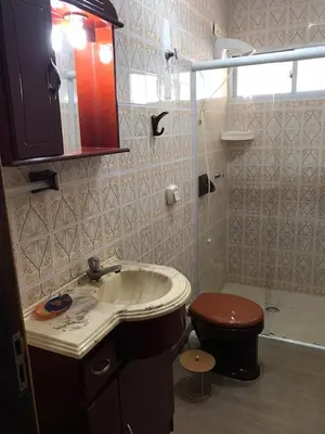 Uma casa de banho em ANSNEGOCIOS KIT-NET PRAIA MARISCAL 203 Maguelli