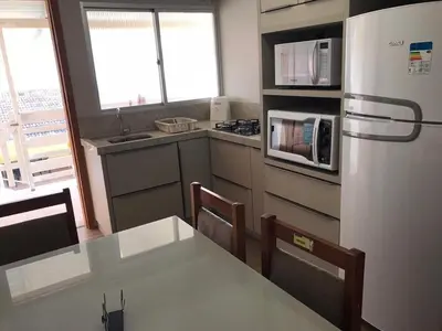 A cozinha ou kitchenette de ANSNEGOCIOS KIT-NET PRAIA MARISCAL 203 Maguelli