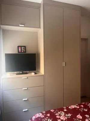 Uma televisão e/ou sistema de entretenimento em Apto familiar, 150mts do mar, completo e aconchegante em Palmas