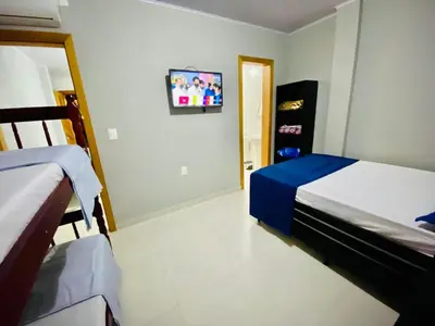 Uma cama ou camas num quarto em Pousada Wall Paraíso
