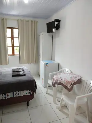 Uma televisão e/ou sistema de entretenimento em Residencial Dona Duda