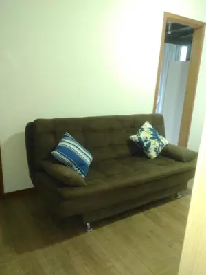 Uma área de estar em Loft no Residencial Marbella à 300 metros da praia