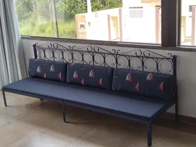 Uma área de estar em Loft no Residencial Marbella à 300 metros da praia