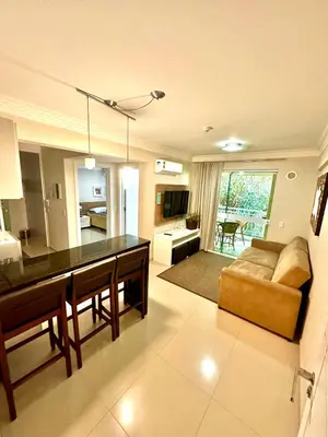Uma televisão e/ou sistema de entretenimento em Bombinhas Summer Beach -Apartamento Particular