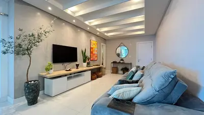 Uma televisão e/ou sistema de entretenimento em COBERTURA com belíssima vista para o mar e jacuzzi