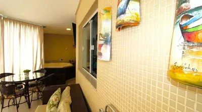 Uma área de estar em 1072 - Apartamento 3 suítes Alto Padrão com SPA na Praia de Bombinhas