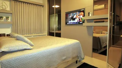 Uma cama ou camas num quarto em 1072 - Apartamento 3 suítes Alto Padrão com SPA na Praia de Bombinhas