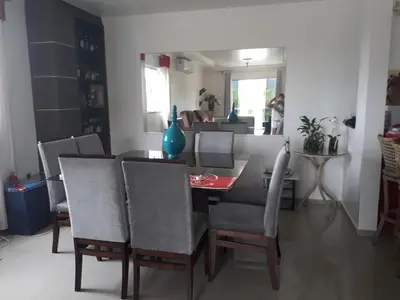 Uma área de estar em Residencial helena cobertura