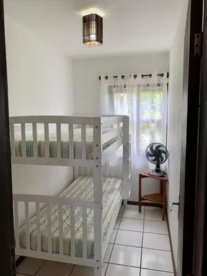 Uma cama ou camas num quarto em Residencial Beija Flor apartamento 31