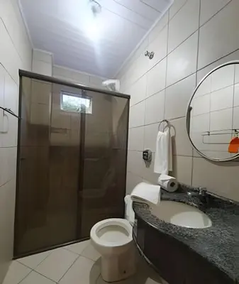 Uma casa de banho em Pousada Acapulco