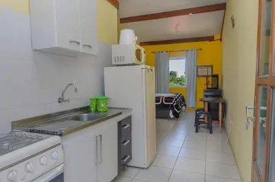 A cozinha ou kitchenette de Pousada Recanto Dom Arthur