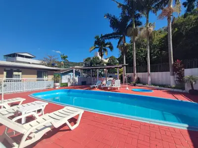 A piscina em ou perto de DK3 - CaSA COM 3 SUITES COM PISCINA BRUNO KLEMTZ