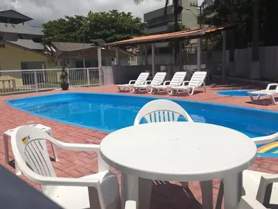 A piscina em ou perto de DK3 - CaSA COM 3 SUITES COM PISCINA BRUNO KLEMTZ