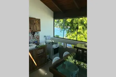 Uma área de estar em 5. Cobertura com Vista Mar 360º Bombinhas