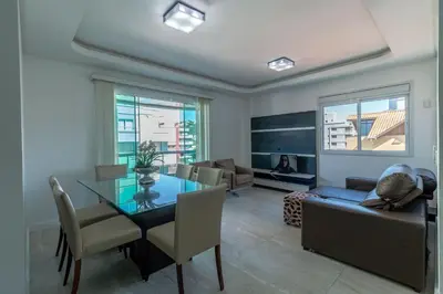 Uma área de estar em Aluguel Apartamento 2 quartos vista mar Bombas/SC
