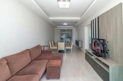 Uma área de estar em Aluguel Apartamento 3 quartos vista mar Bombas SC