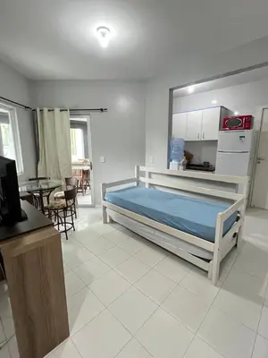 Uma cama ou camas num quarto em Residencial Melfi 3 - Apto 04 - Lateral