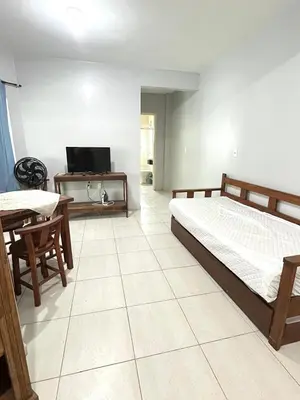 Uma televisão e/ou sistema de entretenimento em Residencial Melfi 3 - Apto 06 - Lateral