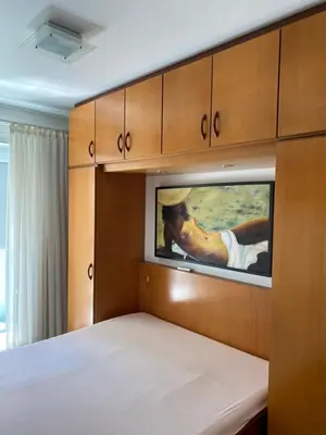 Uma cama ou camas num quarto em Apartamento Aconchegante Beira Mar em Itapema - Santa Catarina