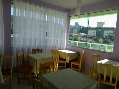 Um restaurante ou outro lugar para comer em Pousada Maré Boa