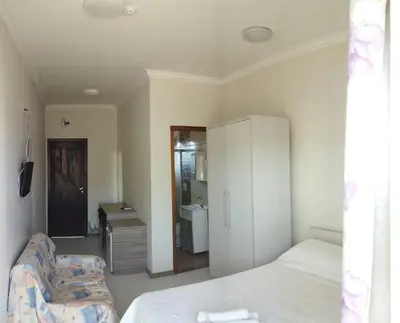Uma cama ou camas num quarto em Pousada Maré Boa