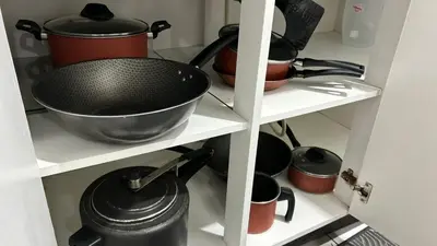 A cozinha ou kitchenette de Frente Mar Apartamento 3Q em Itapema, Meia Praia, suite e 2BWC, Ar Condicionado, Smart TV, garagem e churrasqueira na sacada