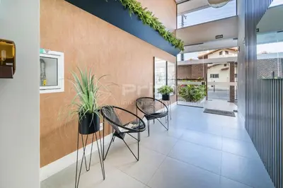 Uma área de estar em SD 203 · Excelente Apartamento em condomínio com Rooftop e Piscina.