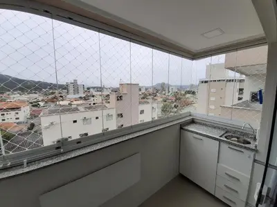 A cozinha ou kitchenette de Lindo apto completo a 150m da praia