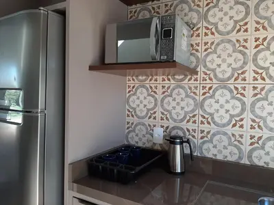 A cozinha ou kitchenette de Excelente Sobrado Confortável no Centro de Tijucas Próximo as Praias