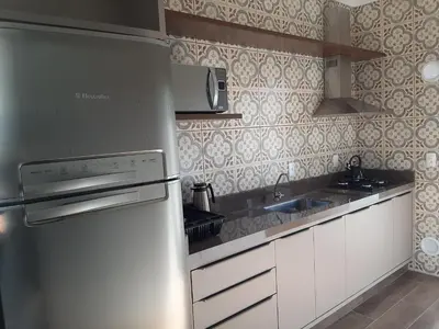 A cozinha ou kitchenette de Excelente Sobrado Confortável no Centro de Tijucas Próximo as Praias