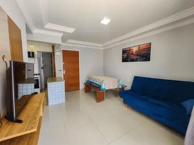 Uma televisão e/ou sistema de entretenimento em Apto El Shadday 301 cento e cinquenta metros do mar