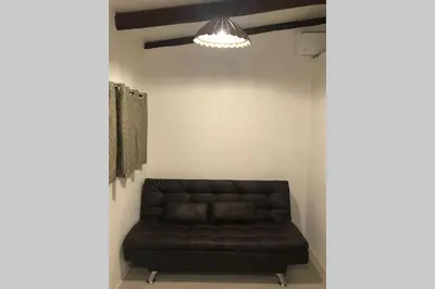 Uma área de estar em 7. Apartamento com Banheira Vista Mar Bombinhas
