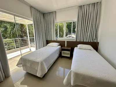 Uma cama ou camas num quarto em Residencial CasapraiadaLagoinha