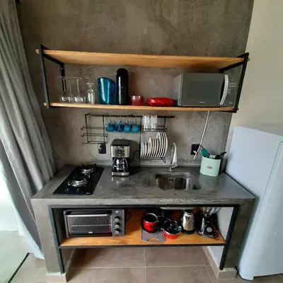 A cozinha ou kitchenette de Maná Mariscal Hospedagem