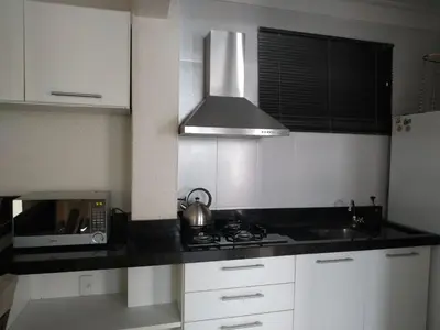 A cozinha ou kitchenette de Vivendas Summer Beach Apto Particular