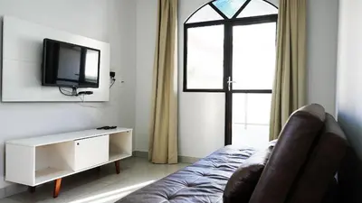 Uma televisão e/ou sistema de entretenimento em Residencial Dona Dina - Mestre Naro