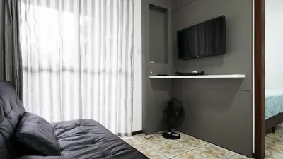 Uma televisão e/ou sistema de entretenimento em Residencial Adolfo - Mestre Naro