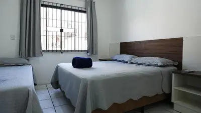 Uma cama ou camas num quarto em Casa Grande - Mestre Naro