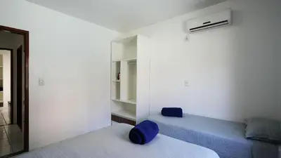 Uma cama ou camas num quarto em Casa Grande - Mestre Naro