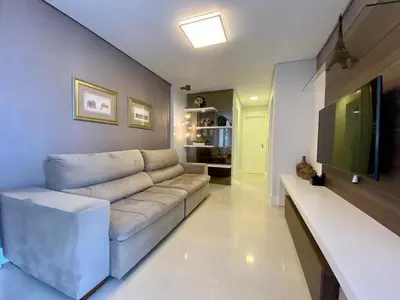 Uma televisão e/ou sistema de entretenimento em Varandas 206 A · Luxuoso Apartamento 3 quartos na Praia de Bombas.