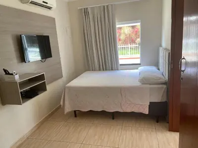 Uma cama ou camas num quarto em Residencial Cecilia Cruz
