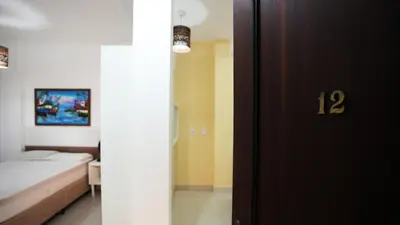 Uma cama ou camas num quarto em Loft 12 residencial beija flor