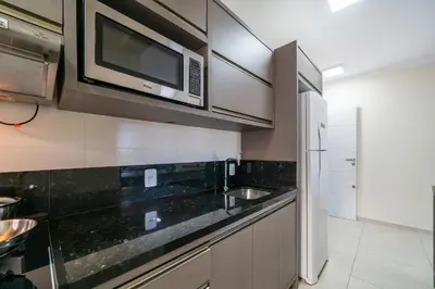 A cozinha ou kitchenette de Manchester 106 A · Lindo e novíssimo Apartamento na praia Bombas.