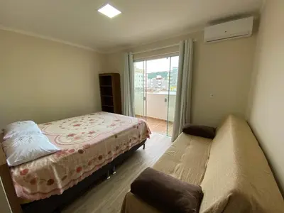 Uma cama ou camas num quarto em Residencial Miguel