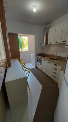 A cozinha ou kitchenette de RESIDENCIAL BORBOLETAS DO MAR