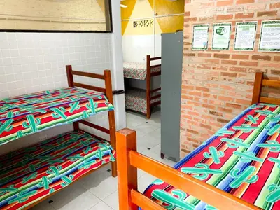 Uma cama ou camas num quarto em Hostel Vento Leste