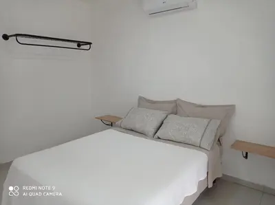 Uma cama ou camas num quarto em Casa com dois pavimentos nova, em Mariscal