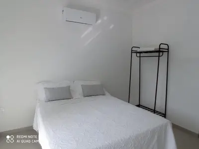Uma cama ou camas num quarto em Casa com dois pavimentos nova, em Mariscal