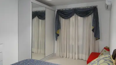 Uma cama ou camas num quarto em Apartamento 21 Residencial Beija Flor