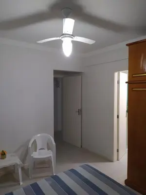 Uma cama ou camas num quarto em AP Itapema